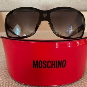 Authentic Moschino pearl trim black sunglasses. Gently used.